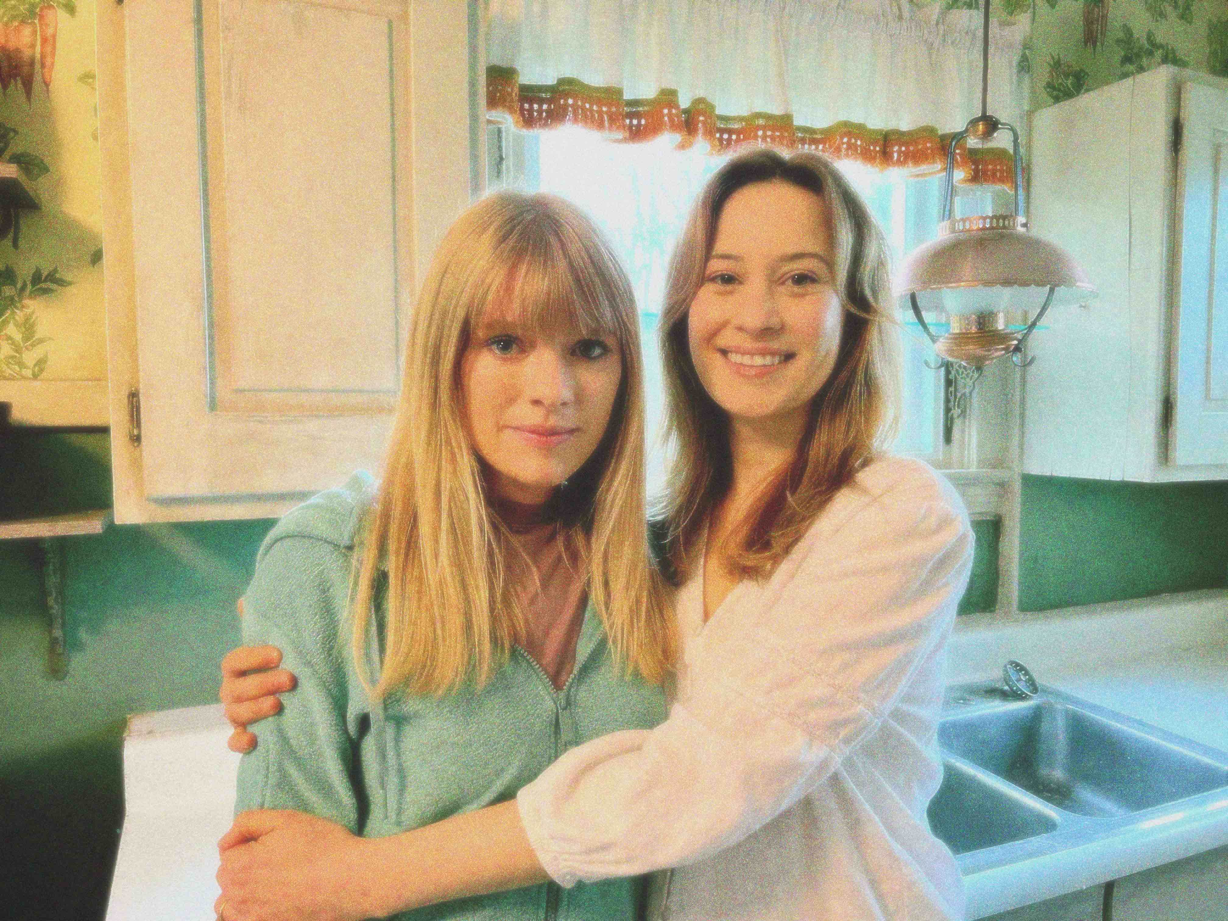 Two people in kitchen